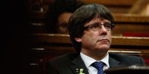 Catalan President Carles Puigdemont attends a plenary session at the Catalan regional Parliament in Barcelona